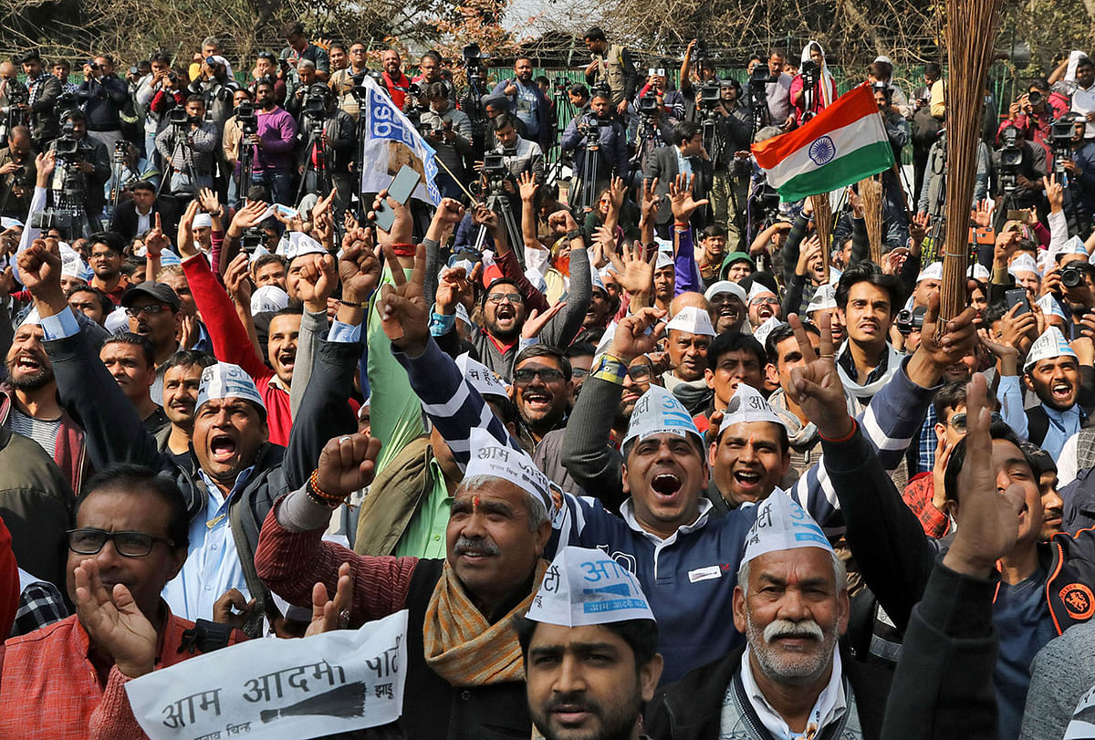 Supporters of Aam Aadmi Party (AAP) celebrate after learning of the initial poll results outside its party headquarters in New Delhi, India, on 11 February 2020. Photo: Reuters