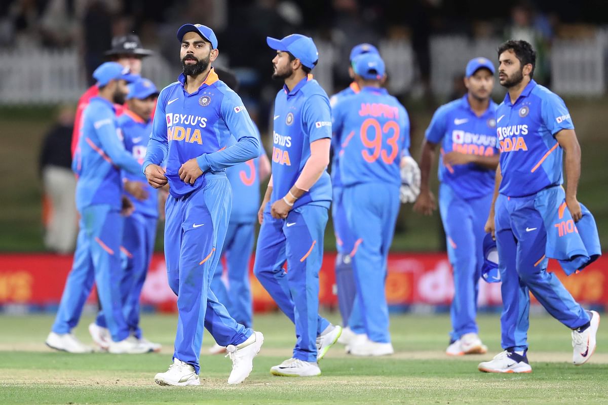 India’s Virat Kohli walks with his players off the field after defeat during the third one-day international cricket match between New Zealand and India at the Bay Oval in Mount Maunganui on 11 February 2020. Photo: AFP
