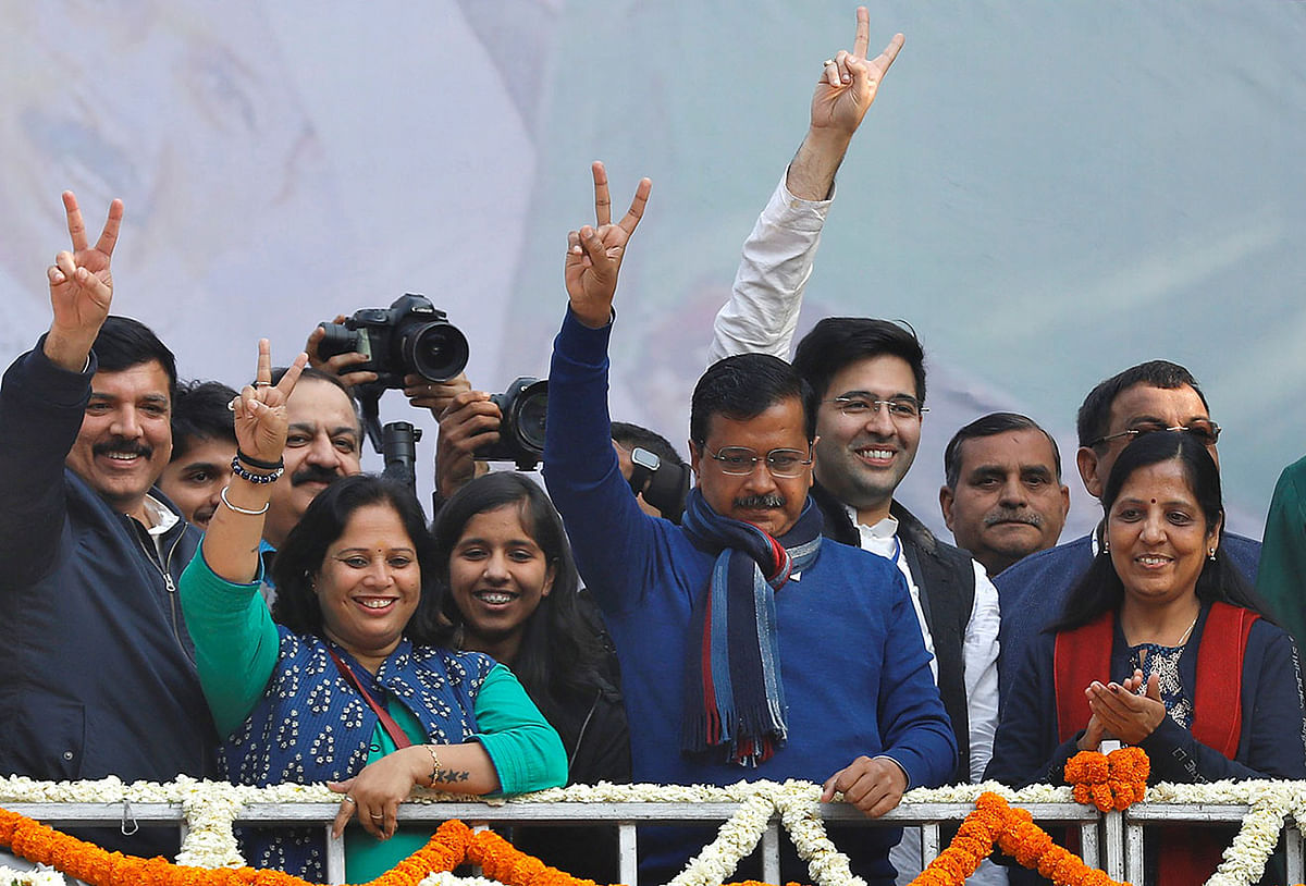 Delhi chief minister and leader of Aam Aadmi Party (AAP) Arvind Kejriwal gestures towards his supporters during celebrations at the party headquarters in New Delhi, India, on 11 February 2020. Photo: Reuters