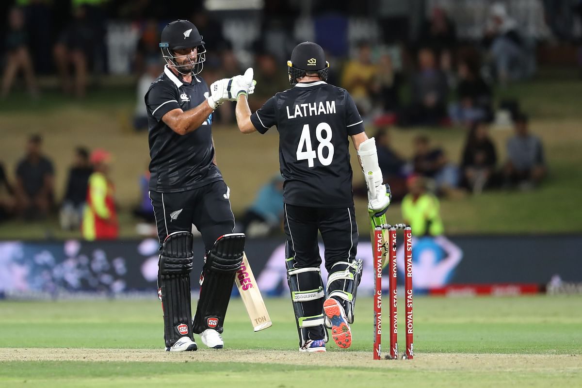 New Zealand’s Colin de Grandhomme (L) and Tom Latham react during the third one-day international cricket match between New Zealand and India at the Bay Oval in Mount Maunganui on 11 February 2020. Photo: AFP