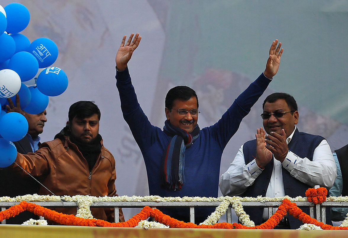Delhi chief minister and leader of Aam Aadmi Party (AAP) Arvind Kejriwal waves to his supporters during celebrations at the party headquarters in New Delhi, India, on 11 February 2020. Photo: Reuters