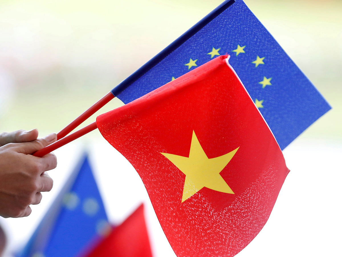 European Union and Vietnamese flags are seen at the signing ceremony of EU-Vietnam Free Trade Agreement at the government office in Hanoi, Vietnam on 30 June 2019. Reuters File Photo