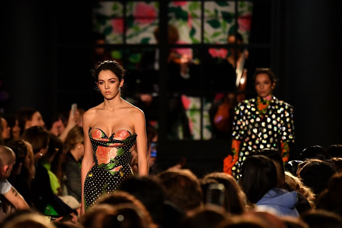 Models present creations by fashion house Richard Quinn during the catwalk show for their Autumn/Winter 2020 collection on the second day of London Fashion Week in London on 15 February. Photo: AFP