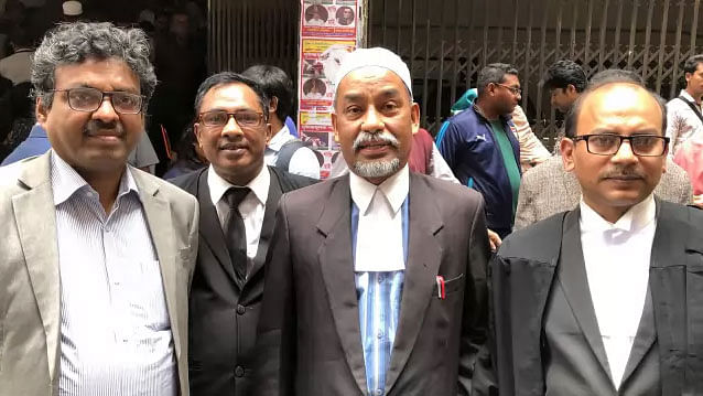 Lawyer Ehsanul Huq Samaji (middle) briefs newsmen after a Dhaka court granted bail to Prothom Alo editor Matiur Rahman on Monday in the case filed over the accidental death of Dhaka Residential Model College student Naimul Abrar. Photo: Prothom Alo