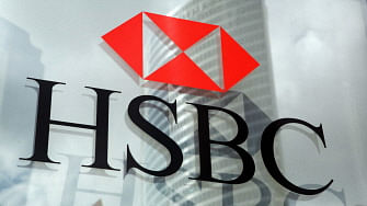 This file photograph taken on 30 June 2009, shows the logo of international banking firm HSBC on display in the business district of La Defense, om the outskirts of Paris. HSBC announced a radical overhaul on 18 February 2020, including plans to slash 35,000 jobs and slim operations in the United States and Europe, after profits slid by a third last year. The Asia-focused lender has been trying to lower costs as it faces a multitude of uncertainties caused by the grinding US-China trade war, Britain's departure from the European Union and now the deadly new coronavirus in China. Photo: AFP
