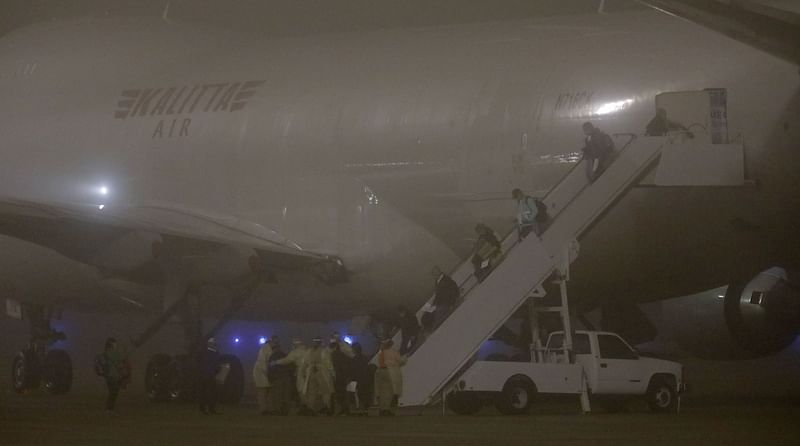 American evacuees from the Diamond Princess cruise ship arrive at Joint Base San Antonio-Lackland on 17 February 2020 in San Antonio, Texas. Photo: AFP