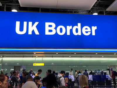 Signage is seen at the UK border control point. Photo: Reuters