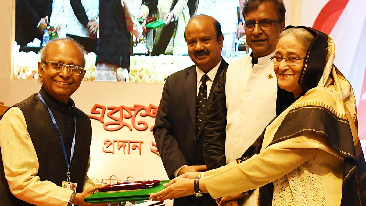 Prime minister Sheikh Hasina hands over the prestigious `Ekushey Padak-2020` as the chief guest at a function at Osmani Memorial Auditorium, Dhaka on 20 February 2020. Photo: PID