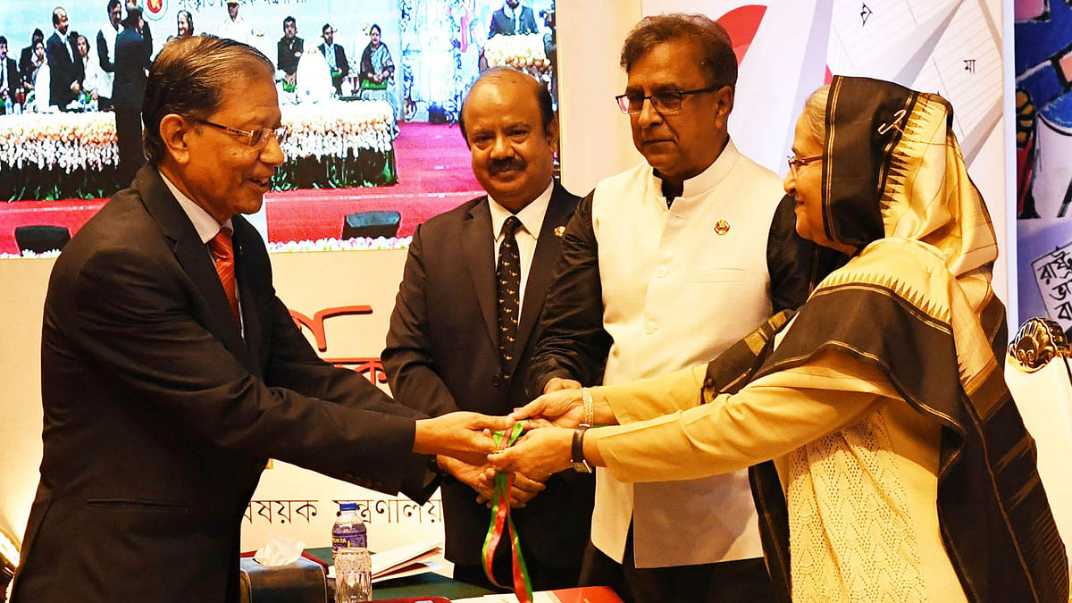 Prime minister Sheikh Hasina hands over the prestigious `Ekushey Padak-2020` as the chief guest at a function at Osmani Memorial Auditorium, Dhaka on 20 February 2020. Photo: PID