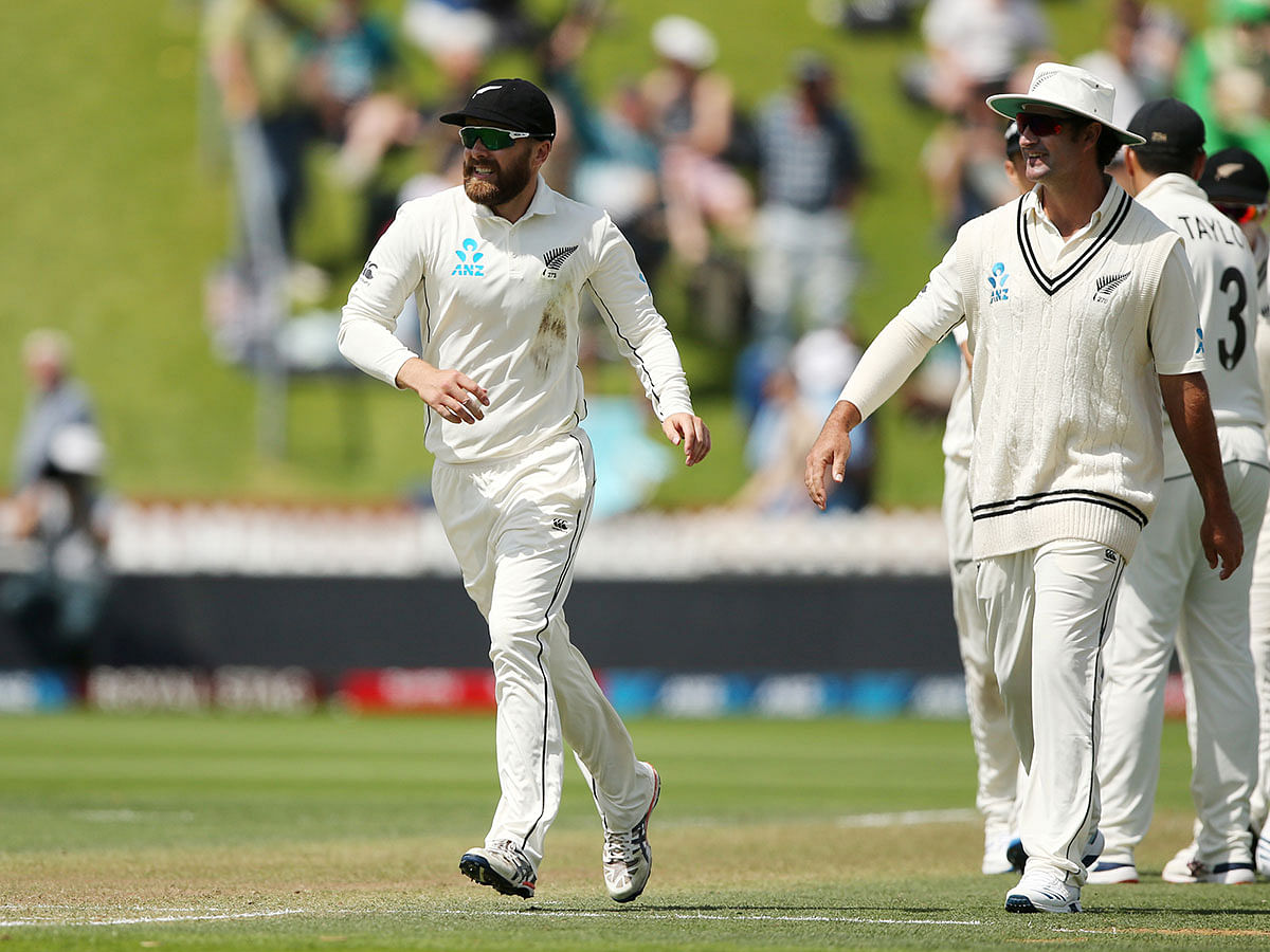 New Zealand`s Tom Blundell celebrates with teammates after taking a catch to dismiss India`s Mohammad Shami during day two of the first Test cricket match at the Basin Reserve in Wellington on 22 February 2020. Photo: Reuters