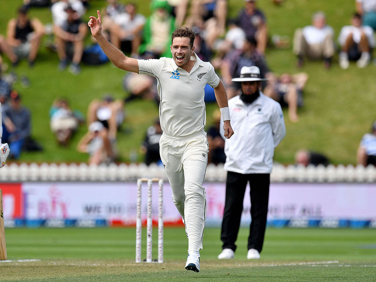 New Zealand`s Tim Southee celebrates India`s Ajinkya Rahane being caught during day two of the first Test cricket match at the Basin Reserve in Wellington on 22 February 2020. Photo: AFP