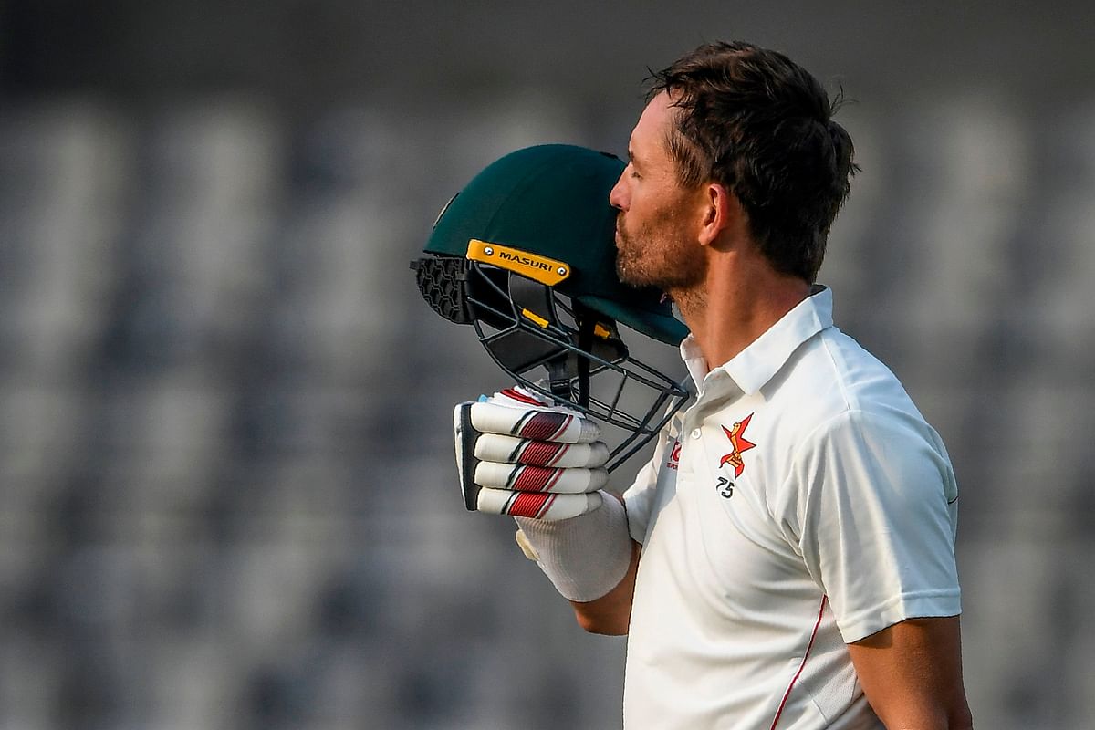 Zimbabwe`s captain Craig Ervine reacts after scoring a century (100 runs) during the first day of the first Test cricket match between Bangladesh and Zimbabwe at the Sher-e-Bangla National Cricket Stadium in Dhaka on 22 February, 2020. Photo: AFP