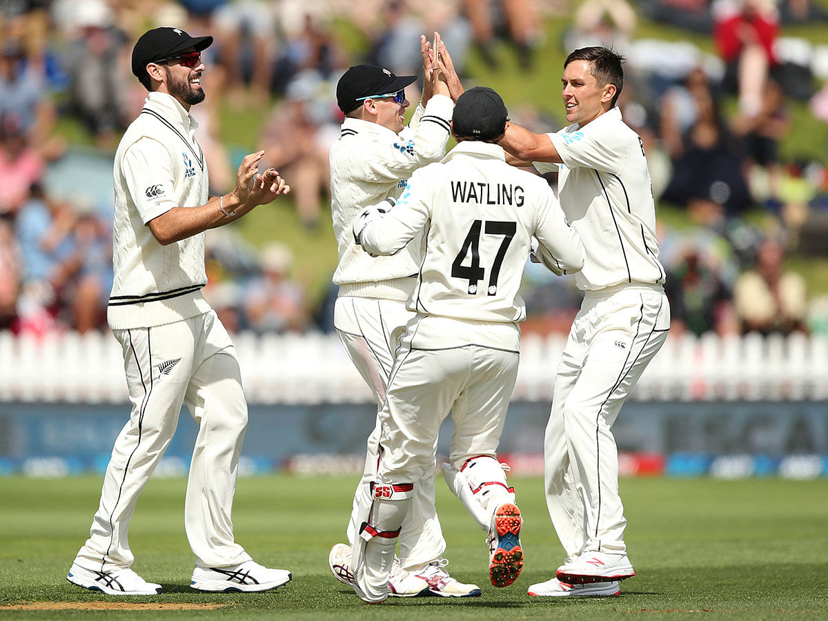 New Zealand`s Trent Boult celebrates the wicket of India`s Prithvi Shaw with teammates in the First Test at Basin Reserve, Wellington, New Zealand on 23 February 2020. Photo: Reuters