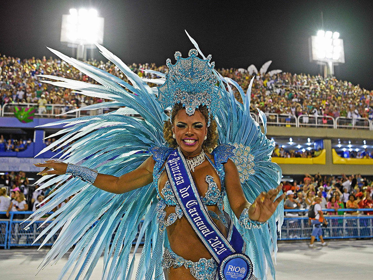A carnival princess performs during the first night of carnival parade at the Sambadrome in Rio de Janeiro, Brazil on 23 February. Photo: AFP