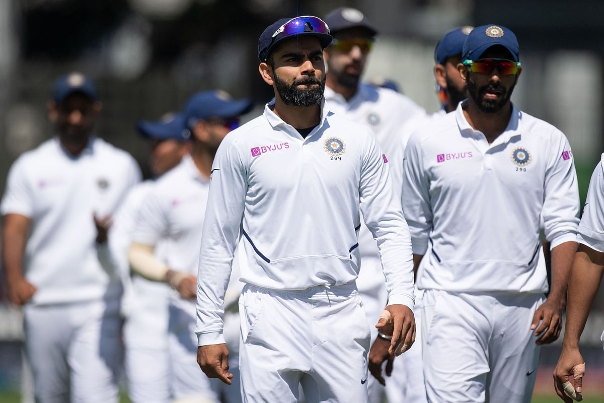 India`s captain Virat Kohli (C) walks from the field with his team after losing the match to New Zealand during day four of the first Test cricket match between New Zealand and India at the Basin Reserve in Wellington on February 24, 2020. Photo: AFP