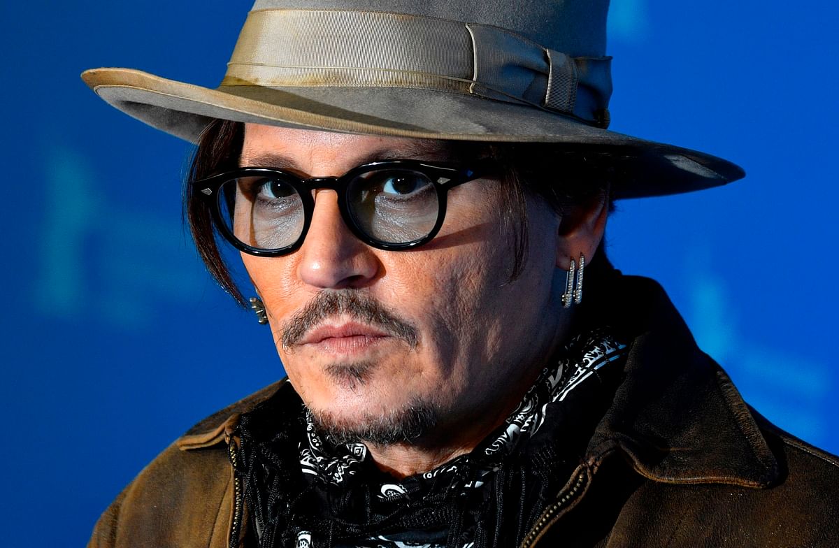 In this file photo taken on 21 February 2020 US actor Johnny Depp poses during a photocall for the film `Minamata` screened in the Berlinale Special Gala on 21 February 2020 at the 70th Berlinale film festival in Berlin. Hollywood star Johnny Depp made a surprise appearance at England`s High Court on 26 February 2020 for a hearing in his libel case against The Sun newspaper. Photo: AFP