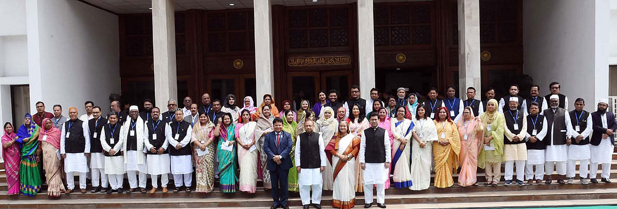 Prime minister Sheikh Hasina takes part in a photo session with DSCC mayor Sheikh Fazle Noor Taposh and councillors at her office (PMO) in Dhaka on 27 February 2020. Photo: PID