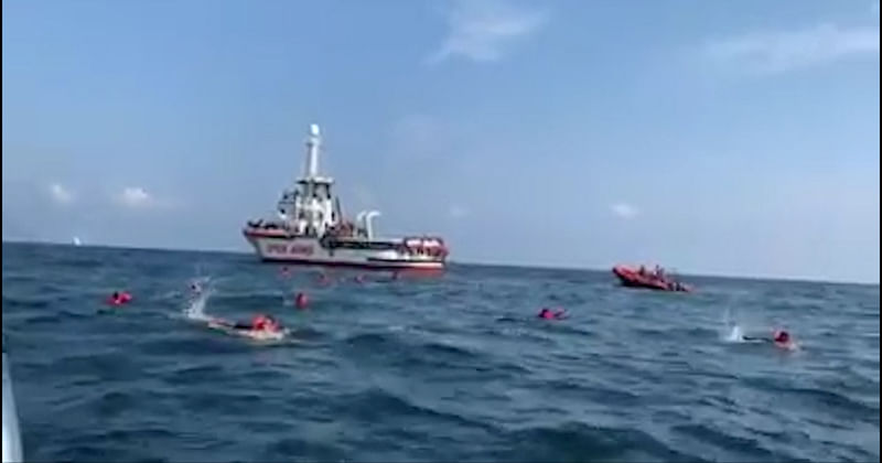 70-migrants-jump-overboard-from-spanish-rescue-ship-off-italy