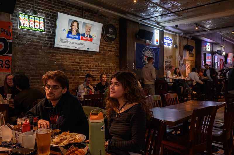 A television screen shows news coverage of the US presidential election results, at a bar in Philadelphia, Pennsylvania on 5 November 2024