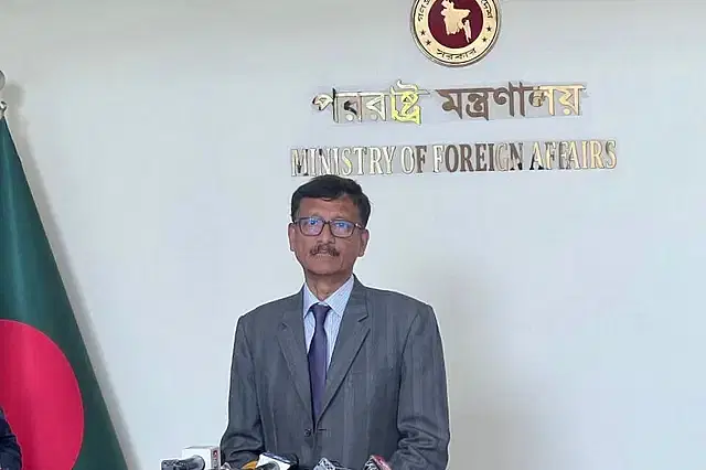 Foreign adviser Md Touhid Hossain answering various queries of the newsmen at the the foreign ministry on Sunday afternoon.