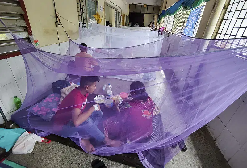 Patients undergo treatment on the balcony of the hospital.