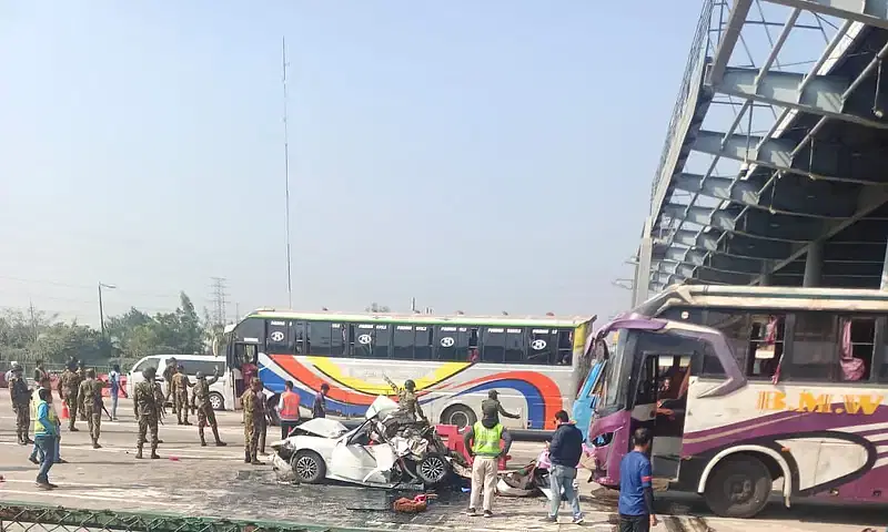 Wrecked vehicles are being removed from Dhaleshwari Toll Plaza on 27 December 2024. 