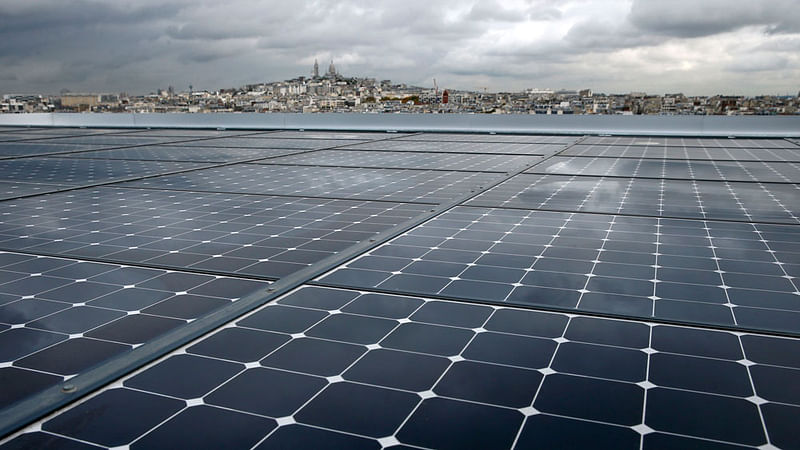 A general view shows solar panels installed in the ‘eco-neighbourhood’ Clichy-Batignolles, one of several new ecological housing developments with low energy use and carbon emissions, in Paris, France, on 22 October 2015